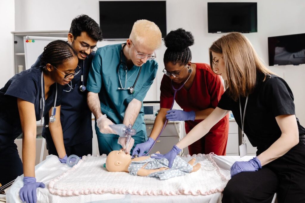 A group of medical professionals take healthcare training courses.