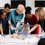 A group of medical professionals take healthcare training courses.