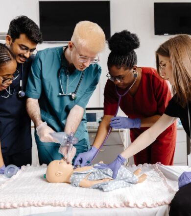 A group of medical professionals take healthcare training courses.