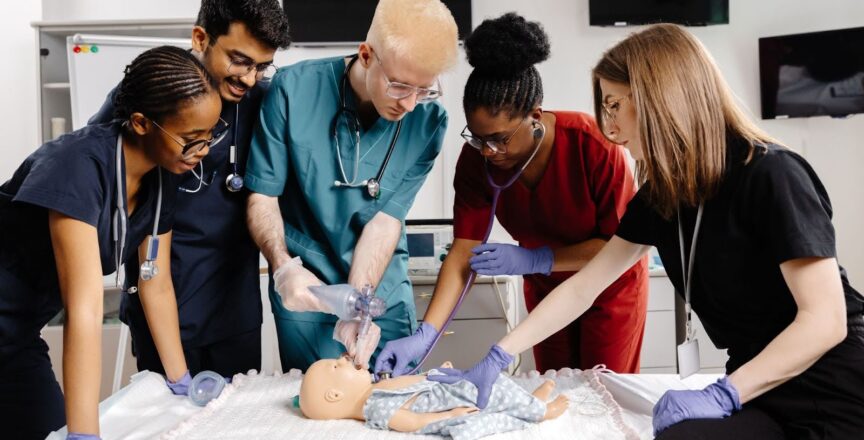 A group of medical professionals take healthcare training courses.
